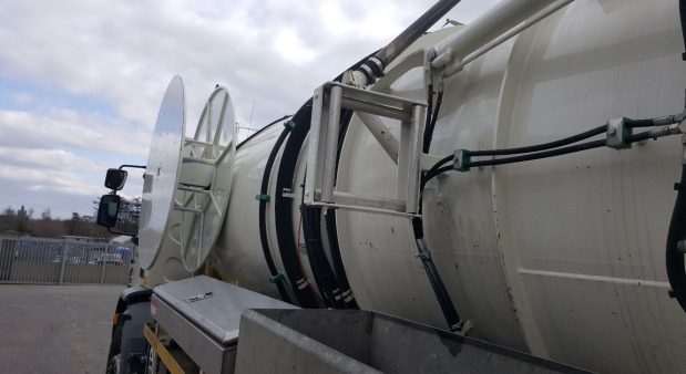 Hydraulic operated suction hose transport reels